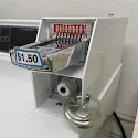 Customer-uploaded photo of a repaired dryer coin box